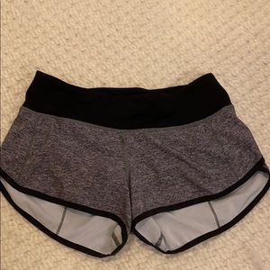 size 2 lululemon speed up grey and black shorts.